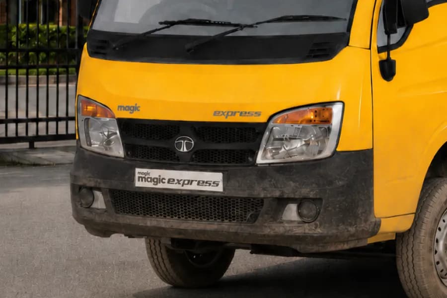 Tata Magic Express Yellow School Van Headlight View