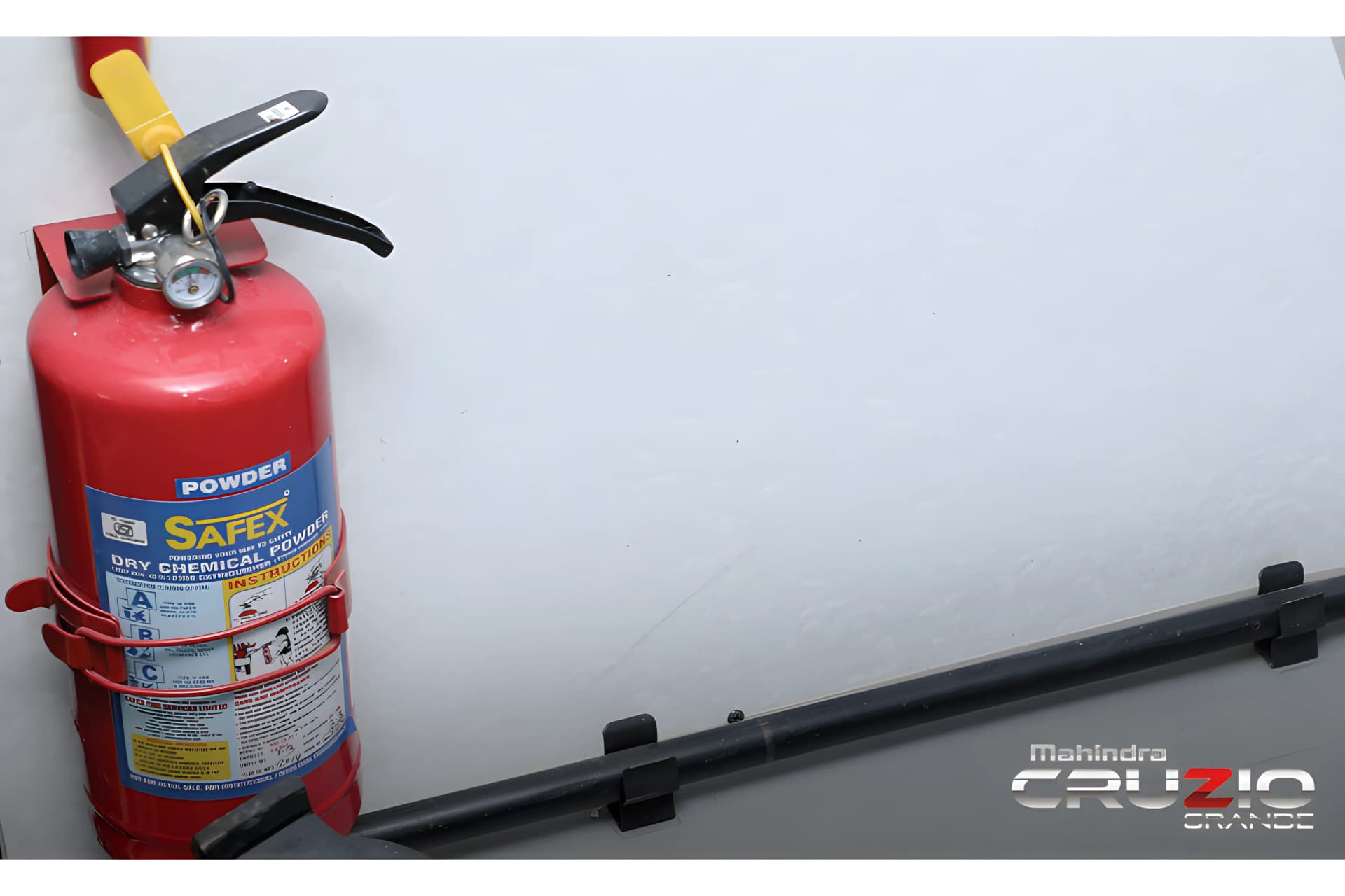 Mahindra Cruzio Grande School Fire Extinguisher View